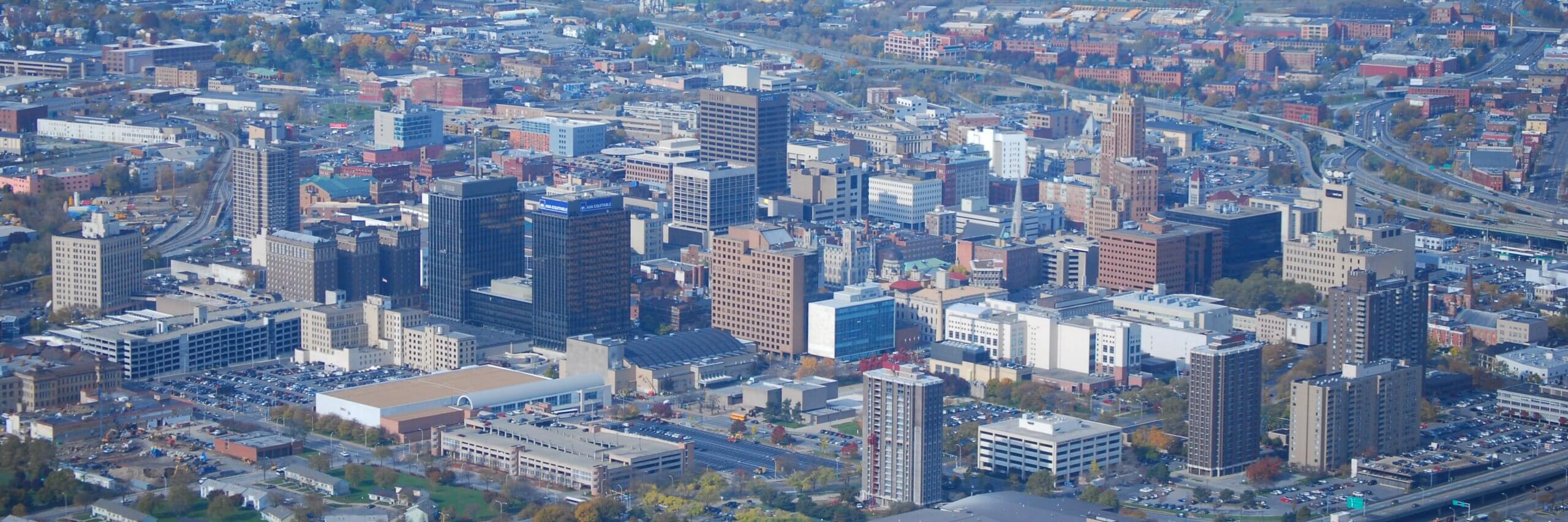 syracuse ny and budget cuts